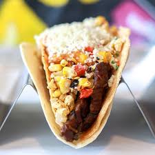 Agave & Rye signature dishes The Crown Jewel (truffle mac & cheese taco)The Alderman (steak taco)The Plain Jane (classic taco)